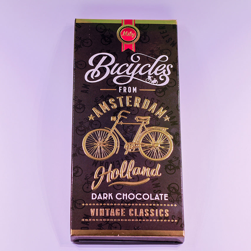 Chokladkaka MÖRKA förpackningen med guldcyckel och texten Amsterdam (chocoladereep Puur) från Matix Souvenir Holland