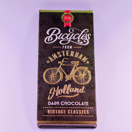 Chokladkaka MÖRKA förpackningen med guldcyckel och texten Amsterdam (chocoladereep Puur) från Matix Souvenir Holland
