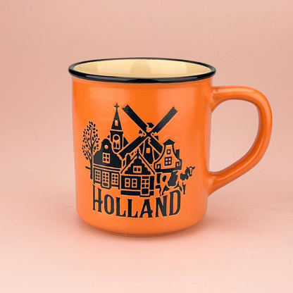 Mugg serien "Camp" orangefärgade keramik med text "Holland" från Matix Souvenir Holland