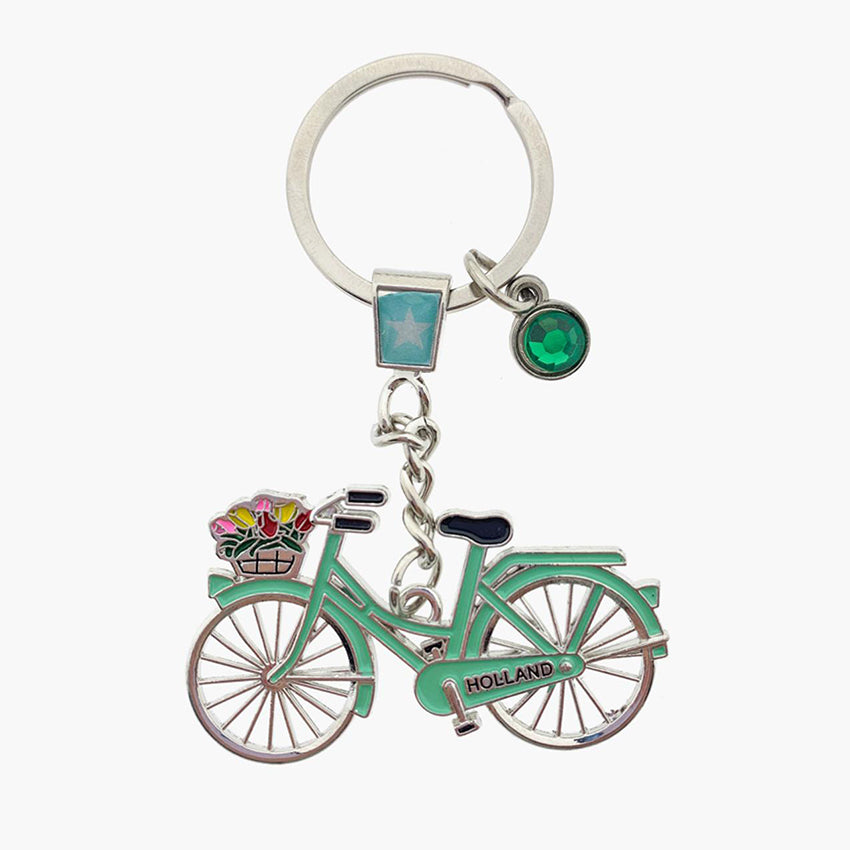 Nyckelring med strassten och pastellgrön cykel med text Holland och cykelkorg med tulpaner från Matix Souvenir Holland