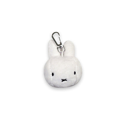 Miffy® plüschnyckelring med mjukt vitt Miffy-huvud i polyesterplysch och metallkedja med nyckelring.