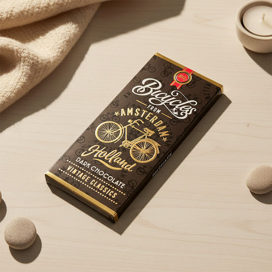 Chokladkaka MÖRKA förpackningen med guldcyckel och texten Amsterdam (chocoladereep Puur) från Matix Souvenir Holland